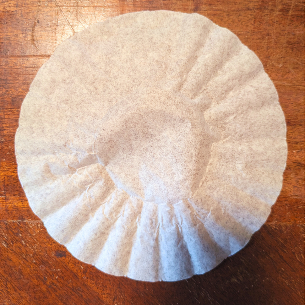 Flattened Coffee filter
