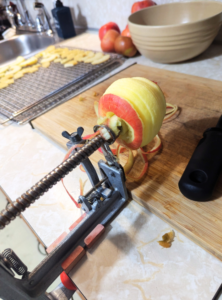 Peeling, slicing, and coring the apple